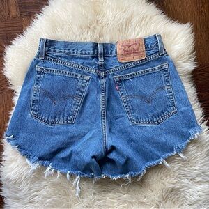 Vintage Levi’s 560s cut offs daisy dukes Y2K 90s era medium wash jean shorts